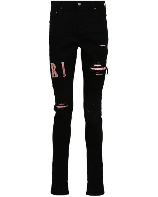 Amiri Black Waxed Logo-appliqué Skinny Jeans for men