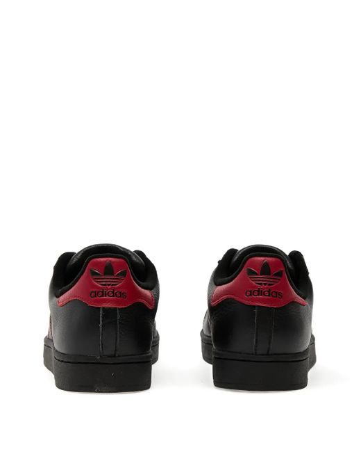 Adidas Black Shell-Toe Striped Trainers for men
