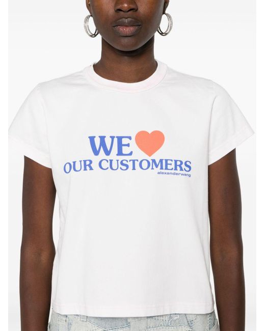 T-shirt con stampa We Love Our Customers di Alexander Wang in White