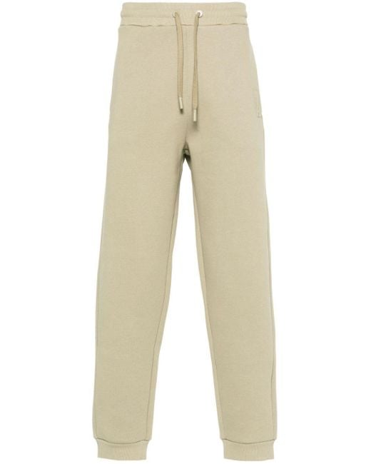 Pantalones de chándal con logo en relieve AMI de color Natural