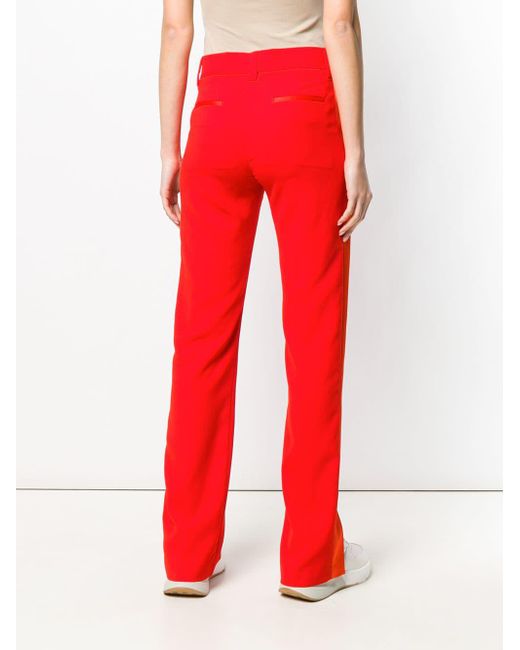 trousers with red side stripe