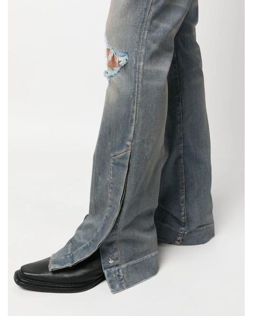 Amiri Blue Ripped-Detail Bootcut Jeans for men