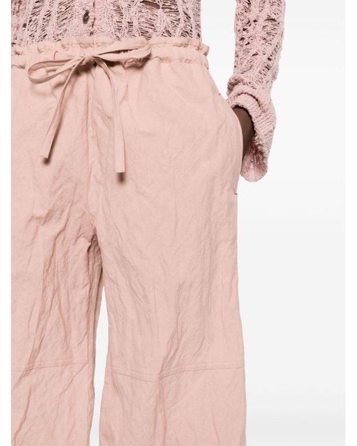 Pantaloni a gamba ampia di Acne in Pink
