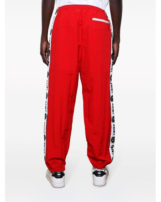 Pantalones de chándal con franja del logo SAINT Mxxxxxx de hombre de color Red