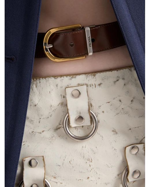 Prada Metallic Ring-Detail Leather Mini Skirt