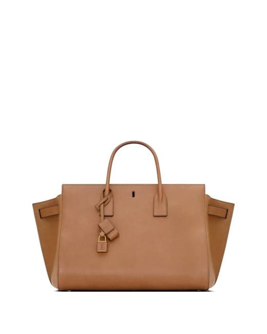 Bolso shopper Sac De Jour con charm Saint Laurent de color Brown