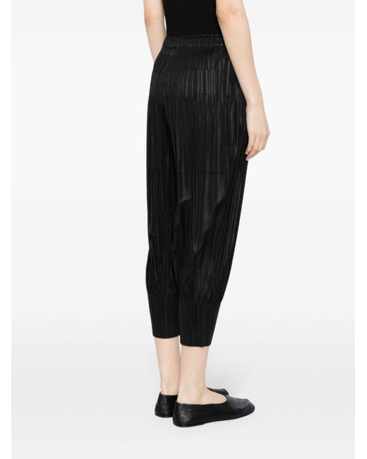 Pleats Please Issey Miyake Tapered Pleated Trousers Black