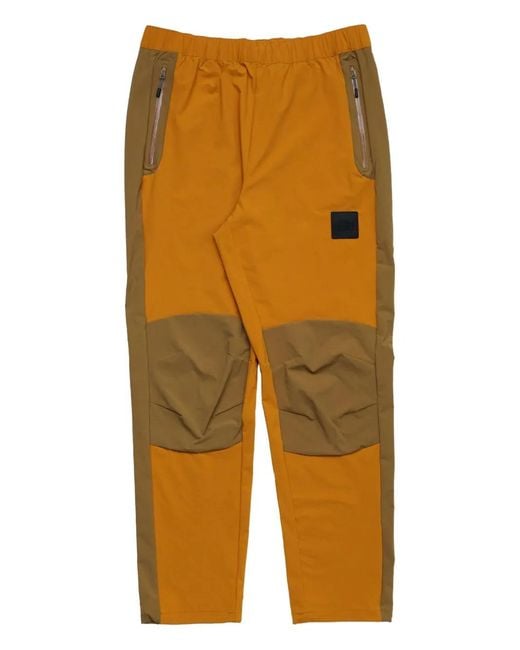 The North Face Yellow Lightweight Shell Trousers for men