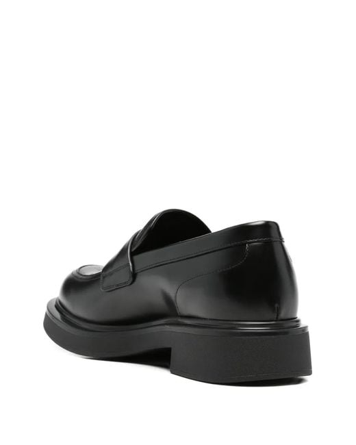 Gucci Black Monogram-Debossed Loafers for men