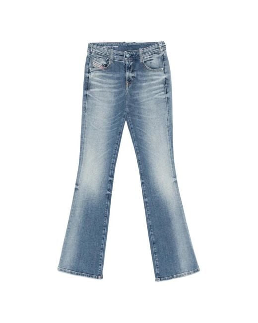 DIESEL Blue Faded Denim Jeans With Flared Silhouette