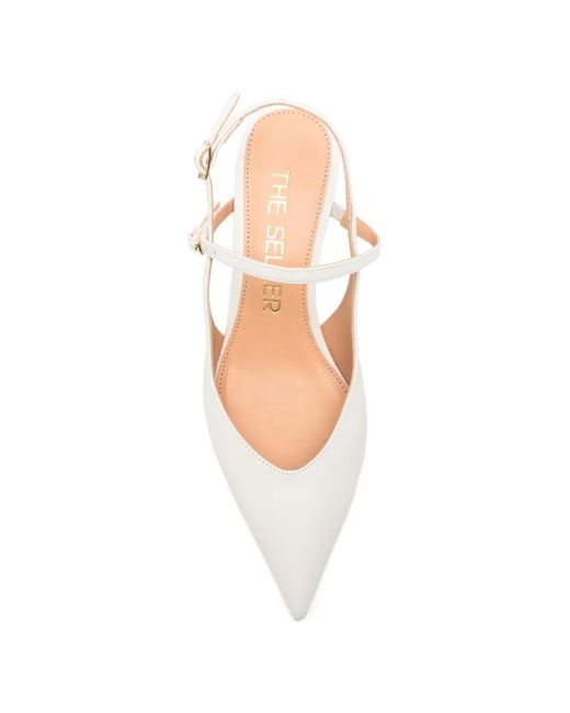 The Seller White Slingback Pumps