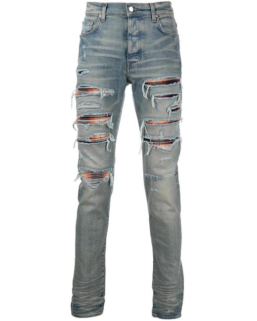 Amiri Blue Distressed Skinny Jeans for men