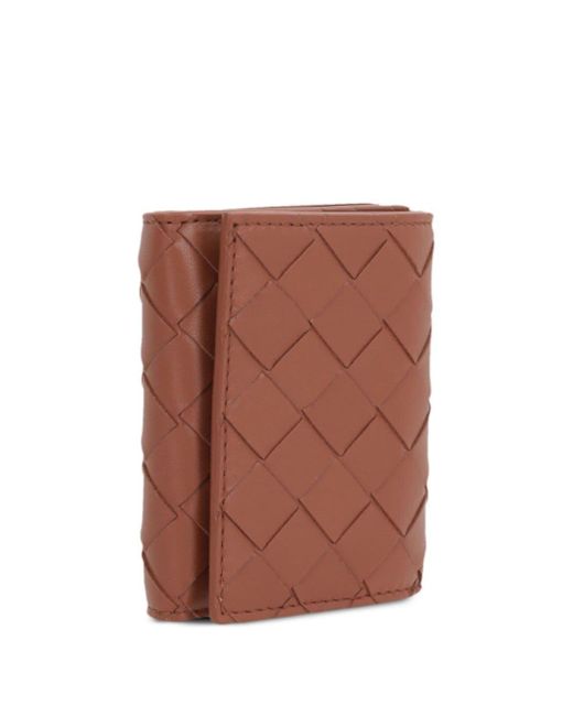 Intrecciato leather wallet Bottega Veneta en coloris Brown