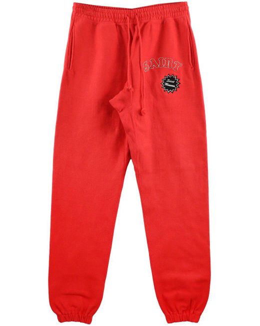 SAINT Mxxxxxx Red Logo-print Cotton Track Pants for men
