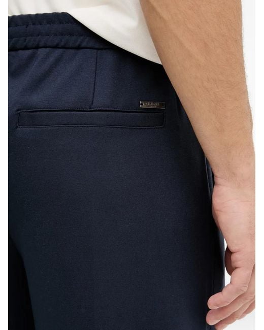 Guess Blue Logo-Plaque Tailored Trousers for men