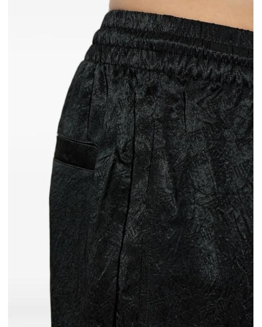 DIESEL Black Logo-Jacquard Elasticated-Waistband Trousers for men