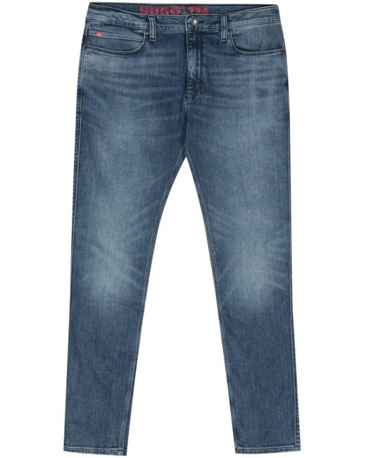 Jeans slim a vita media di HUGO in Blue da Uomo
