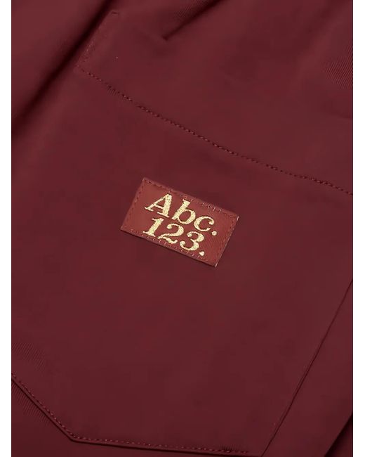 Advisory Board Crystals Red Logo-Patch Trousers for men