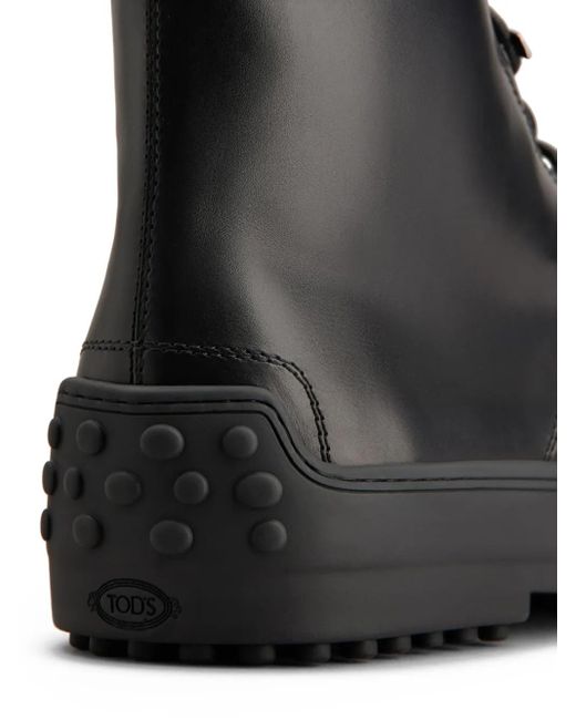 Tod's Black Leather Combat Boots for men