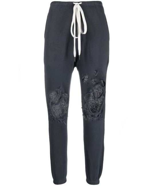 distressed track pants