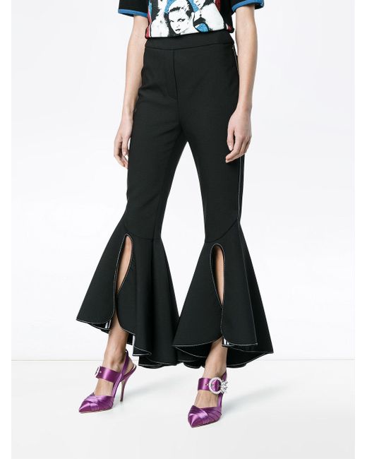 black fitted flared trousers