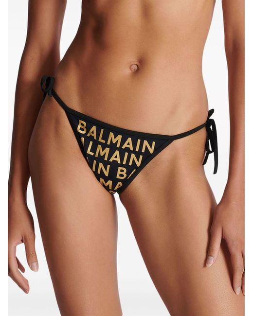 Bikini triangular con logo estampado Balmain de color Black