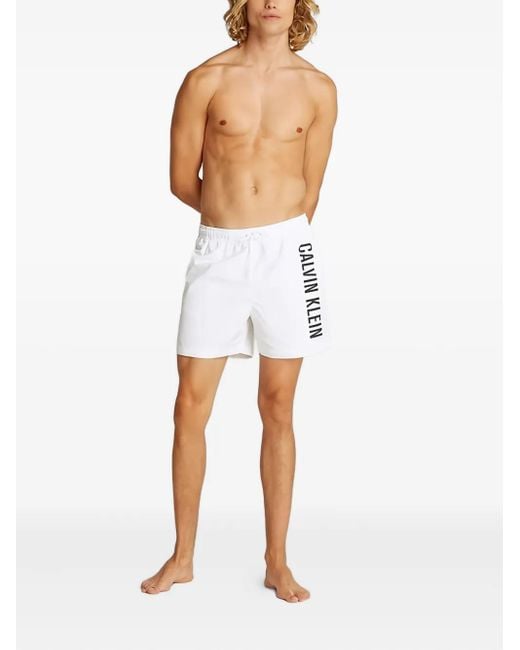 Short De Bain À Logo Imprimé Calvin Klein pour homme en coloris White