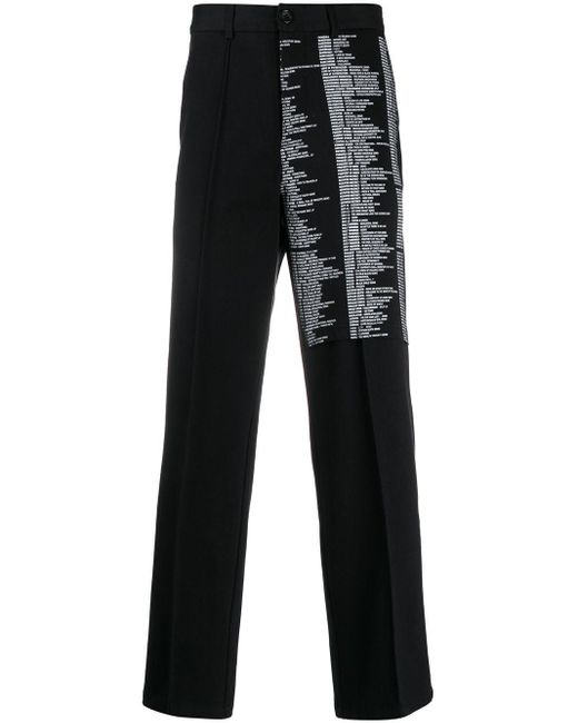 Yang Li Black Script Print Tailored Trousers for men