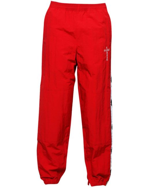 SAINT Mxxxxxx Red Logo-tape Track Pants for men