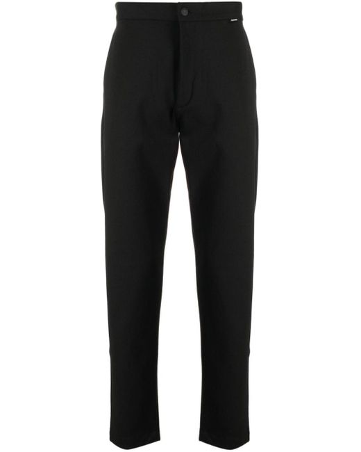 Pantaloni con banda logo di Calvin Klein in Black da Uomo
