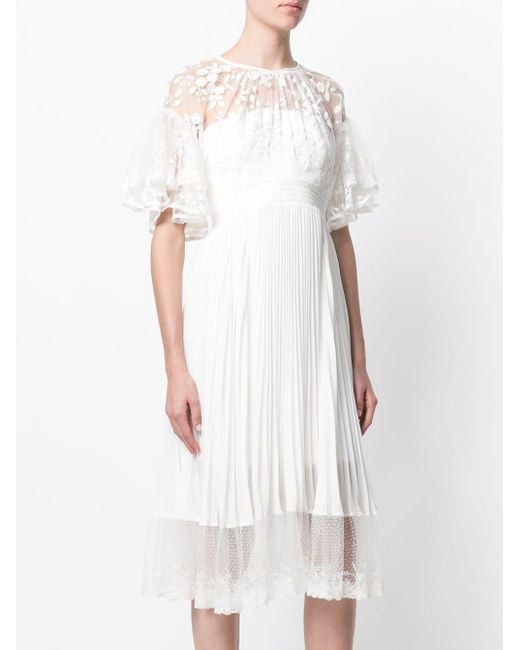 three floor white dress