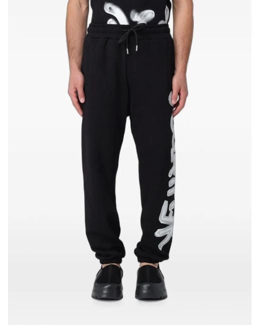 DISCLAIMER Black Logo-Print Drawstring Track Pants for men