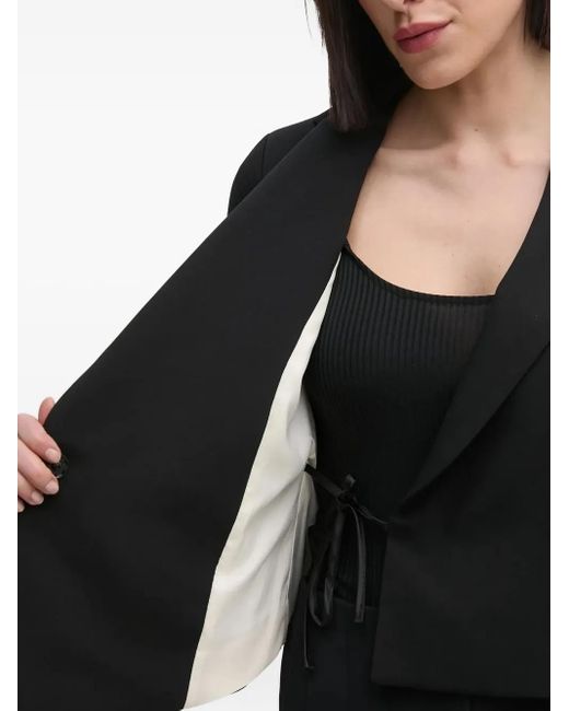 Blazer drapeado asimétrico Sandro Ferrone de color Black