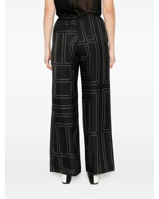 Totême Black Monogram Silk Trousers