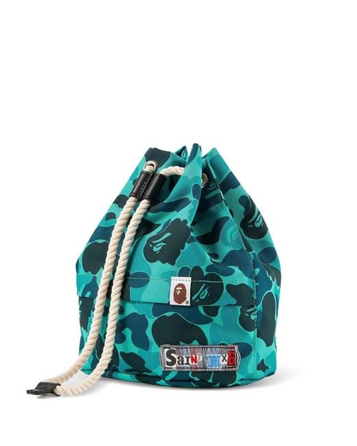 SAINT Mxxxxxx Blue X A Bathing Ape Handbag