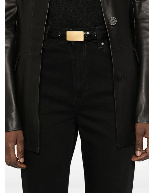 Jean À Patch Logo Totême  en coloris Black