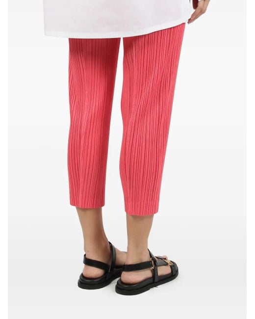 Pleats Please Issey Miyake Red Pleated Cropped Trousers