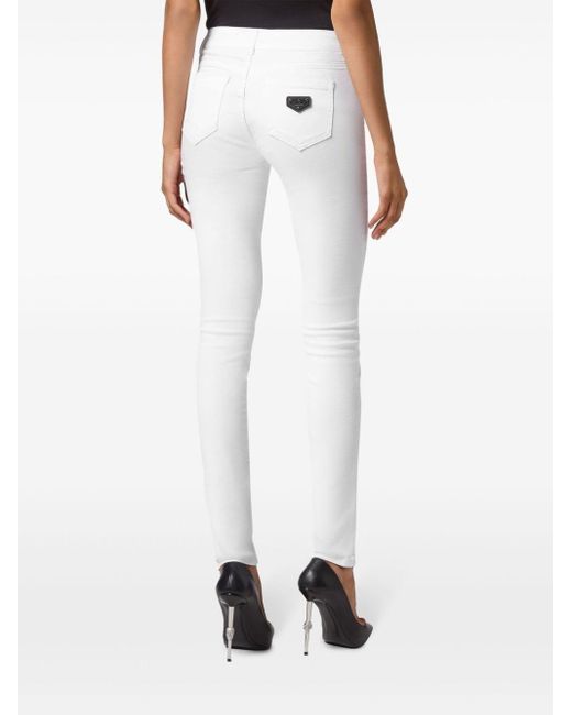 Jeans skinny con placca logo di Philipp Plein in White