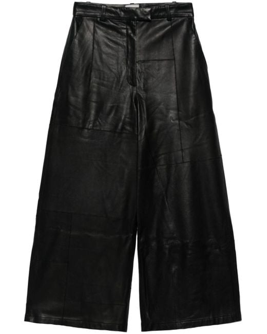 Pantaloni crop a gamba ampia di Alysi in Black
