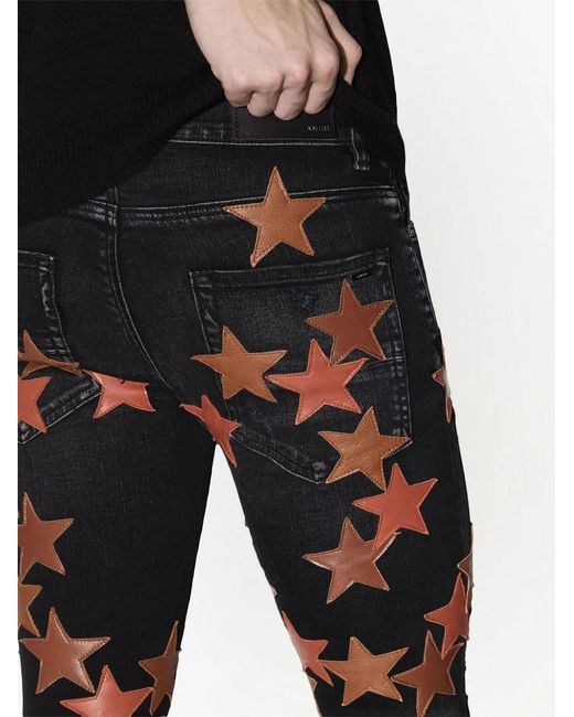Amiri Black Star-Patch Jeans for men