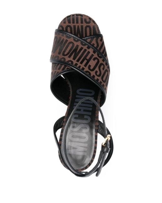 Sandalias con plataforma y logo Moschino de color Black