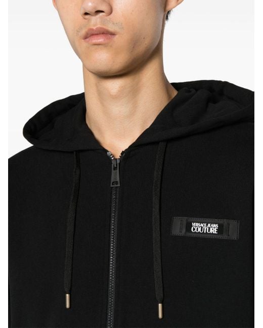 Hoodie zippé en coton à patch logo Versace pour homme en coloris Black