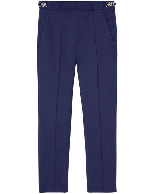 Pantalones ajustados con pinzas Versace de hombre de color Blue