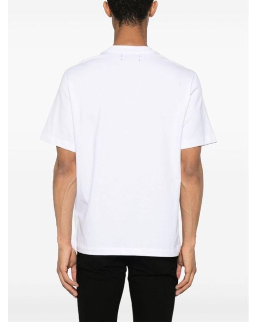 T-shirt en coton à logo imprimé Amiri pour homme en coloris White
