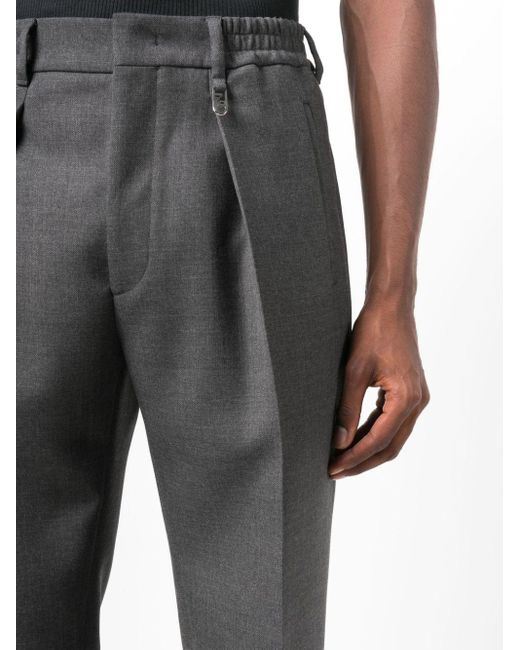 Pantaloni affusolati di Fendi in Gray da Uomo