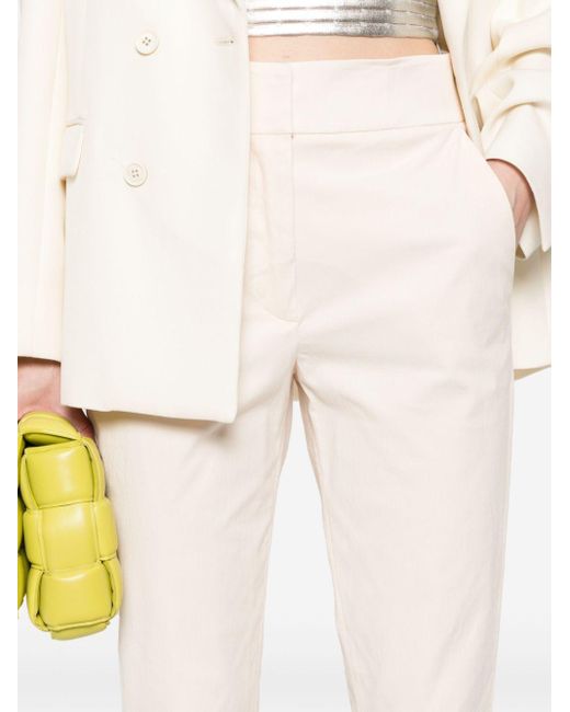 Genny White Crinkled-finish Flared Trousers