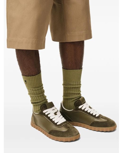 Baskets Step En Cuir À Perforations AMI en coloris Green