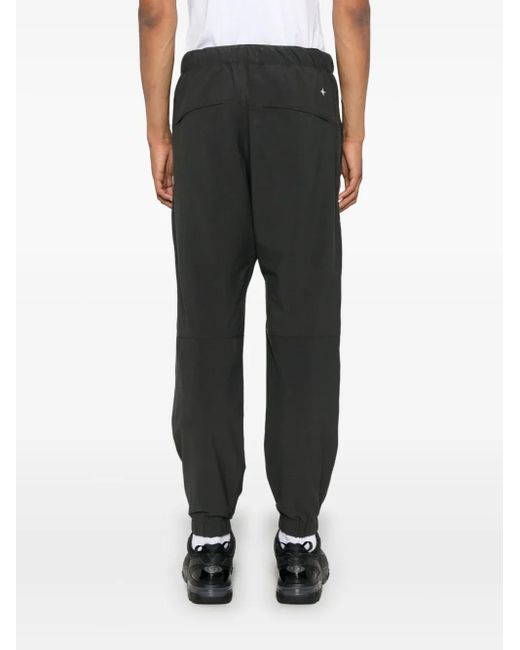 Pantalon À Chevilles Élastiquées Stone Island pour homme en coloris Black