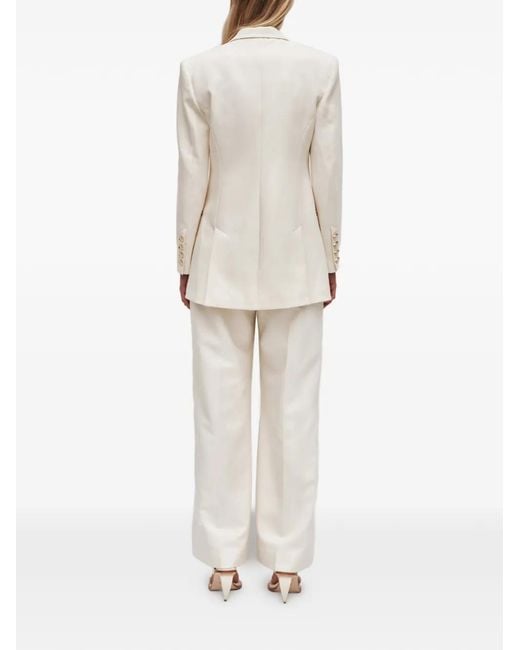 Aje. Natural Vortex Pressed-Crease Trousers