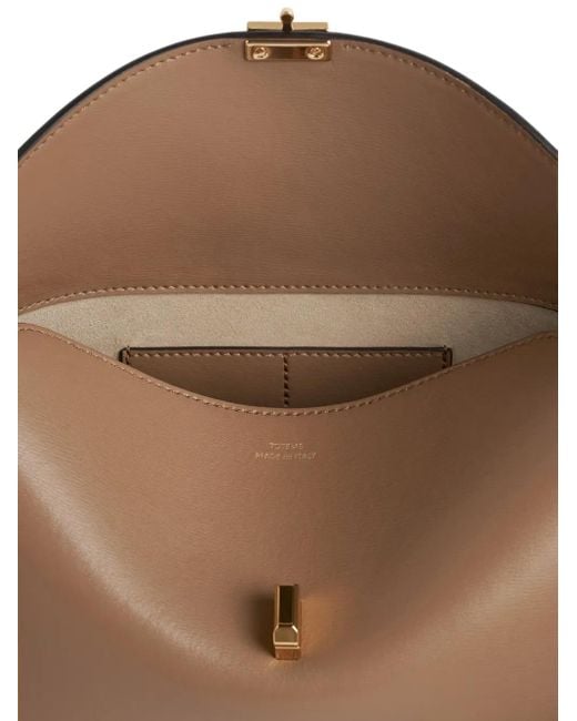 Totême  Natural "T-Lock" Leather Clutch Bags